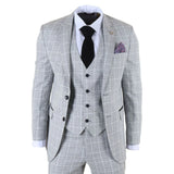 Gray checkered suit with a black tie and purple pocket square on a white background